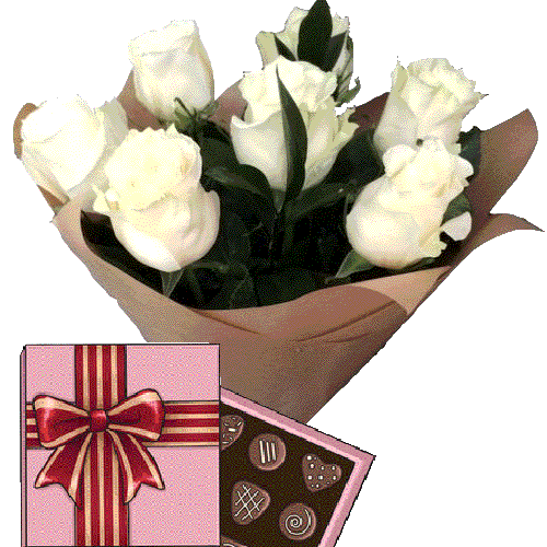Фото товара 7 білих троянд із цукерками в Черкассах